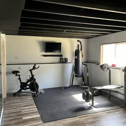 Completed basement remodeling project by ALX